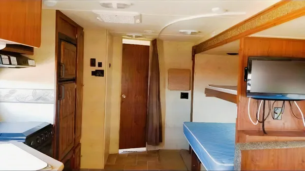 Jessica's 25’ Flagstaff Trailer with large slide and bunk