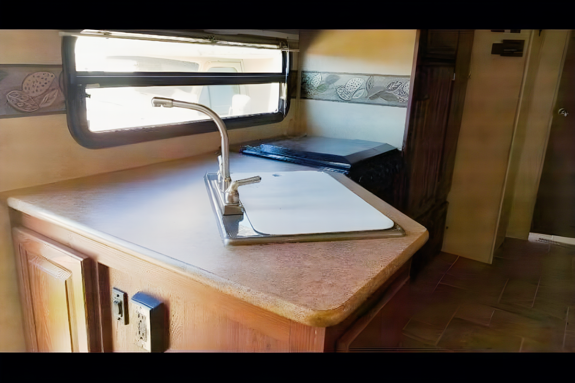 Jessica's 25’ Flagstaff  Trailer with large slide and bunk