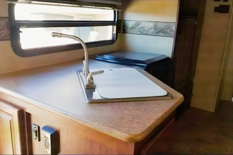 Jessica's 25’ Flagstaff  Trailer with large slide and bunk