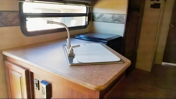 Jessica's 25’ Flagstaff Trailer with large slide and bunk