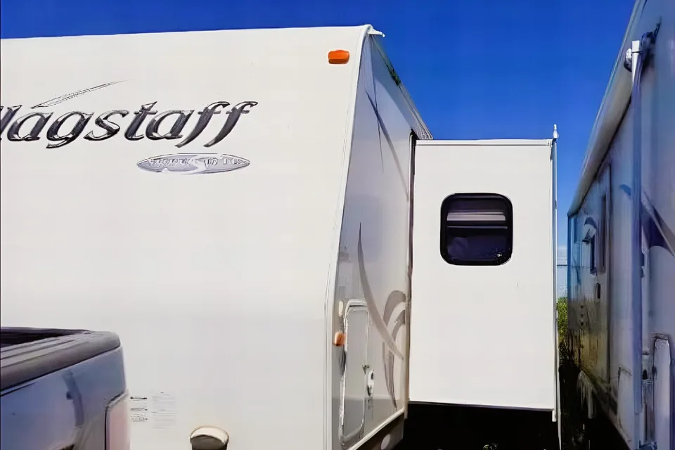 Jessica's 25’ Flagstaff  Trailer with large slide and bunk