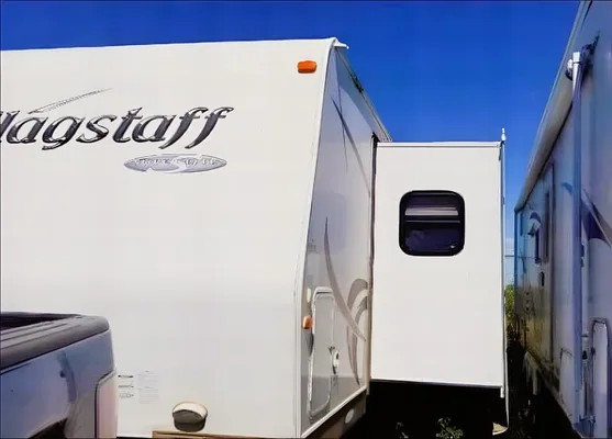Jessica's 25’ Flagstaff Trailer with large slide and bunk