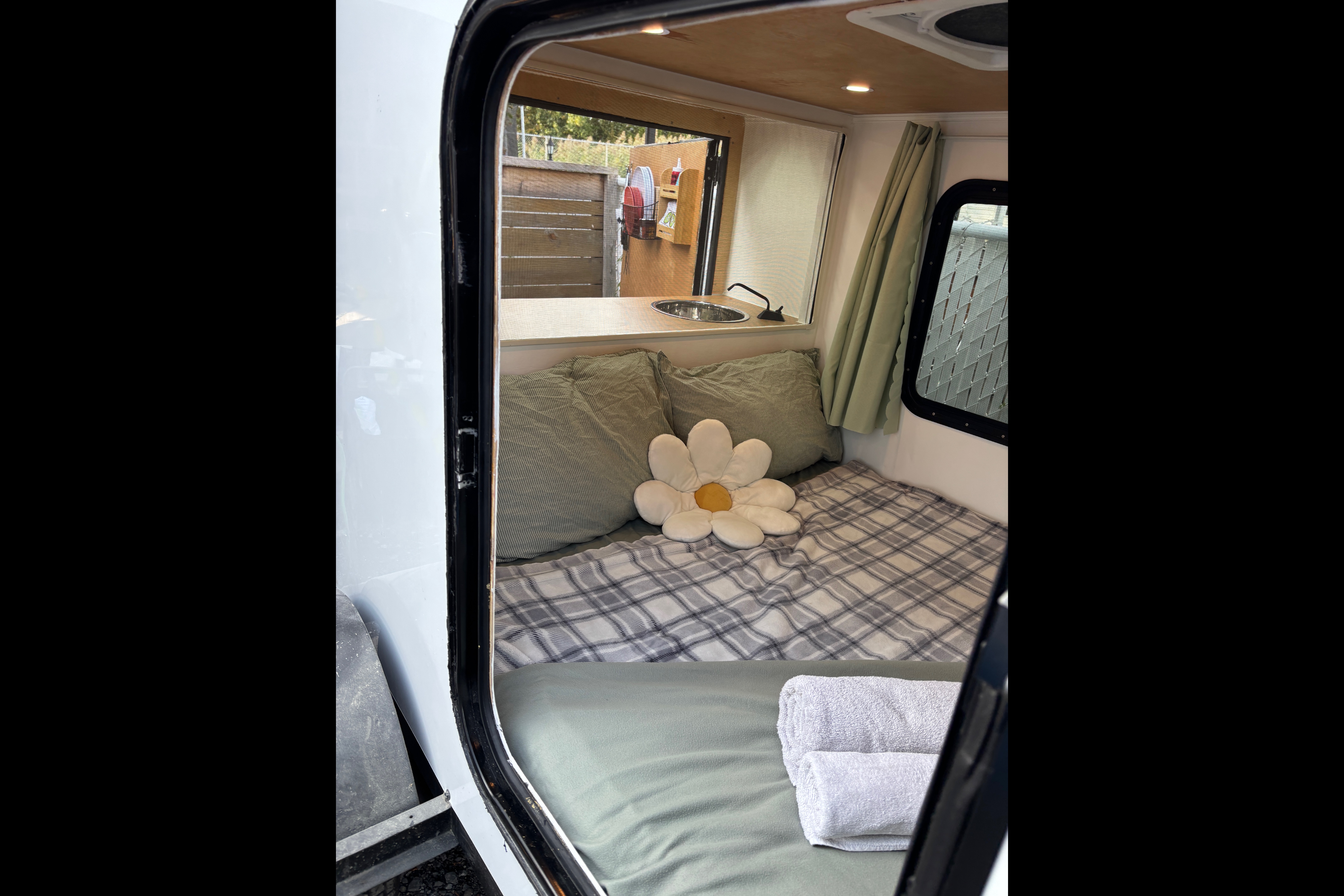 Spacious Square-Drop trailer with a small kitchen