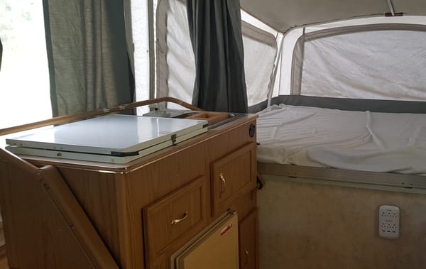 Vintage Adventure Coleman Santa Fe Tent Trailer