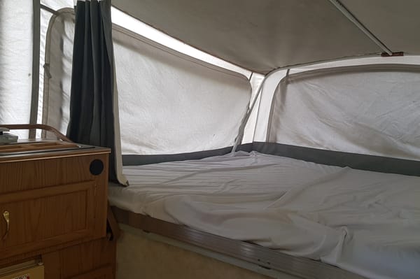 Vintage Adventure Coleman Santa Fe Tent Trailer