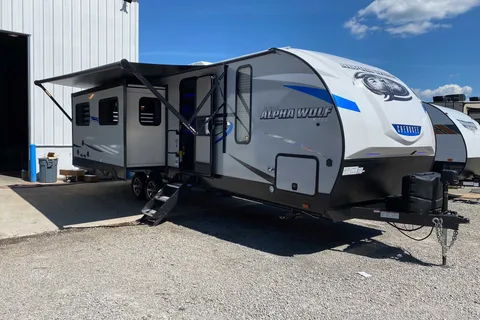 Matt and Shannon Forest River Alpha Wolf 26RL-L Travel Trailer