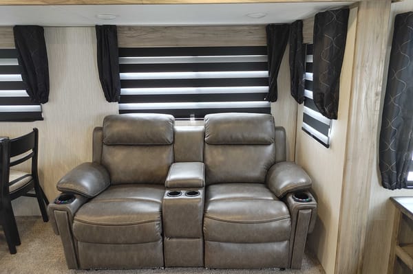 Matt and Shannon Forest River Alpha Wolf 26RL-L Travel Trailer