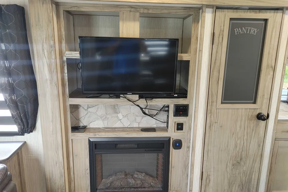 Matt and Shannon Forest River Alpha Wolf 26RL-L Travel Trailer