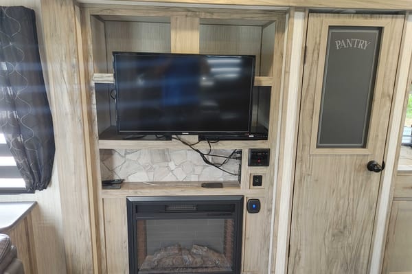 Matt and Shannon Forest River Alpha Wolf 26RL-L Travel Trailer